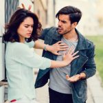 Annoyed boyfriend arguing with his girlfriend